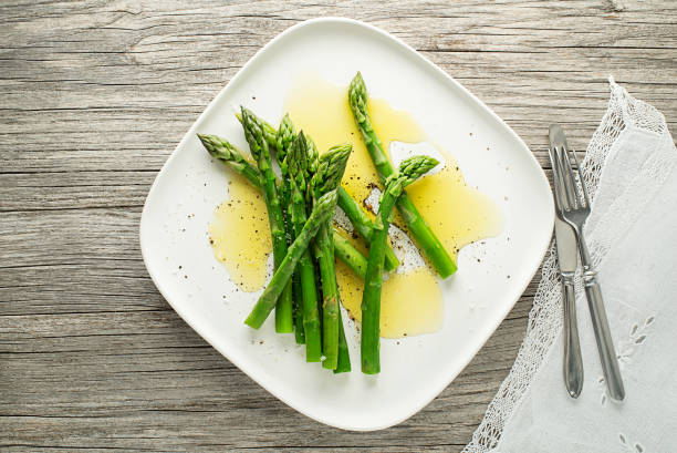 istock Fresh boiled Asparagus with dressing sauce 1222780686
