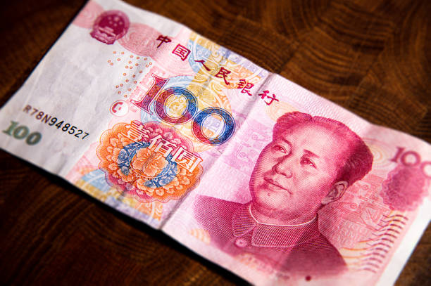 istock China money in male hands 1222782186
