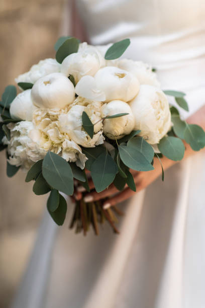 istock Wedding bouquet of bride that she holds in her hands 1222783618