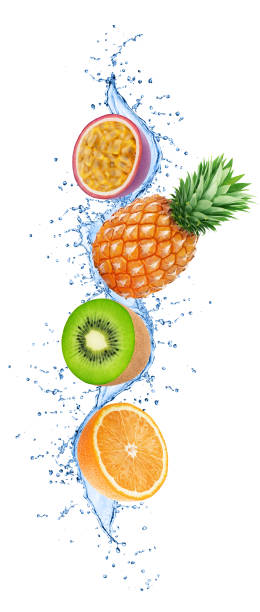 istock Composition with tropical fruits in water splashes isolated on white background. 1222784719