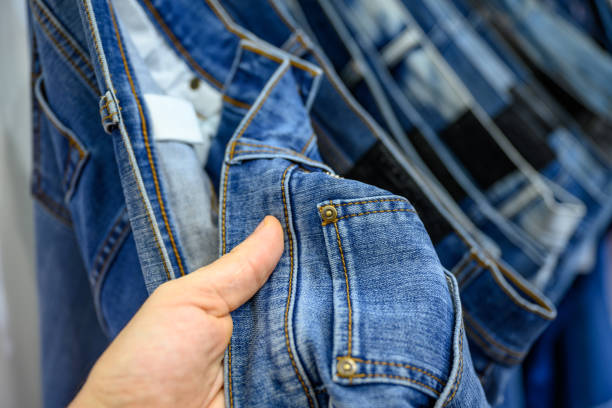istock Man choosing jeans the shop 1222785273