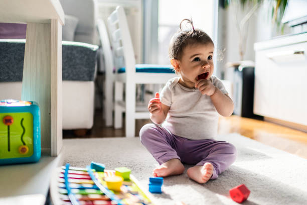 istock Happy baby is playing 1222785312