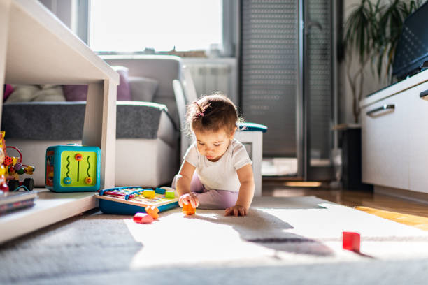 istock Happy baby is playing 1222785727