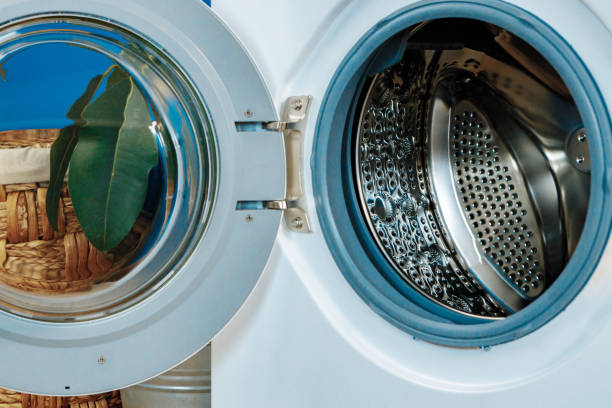 istock Close up of washing machine in bathroom. 1222785747
