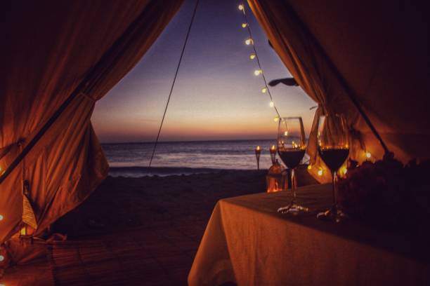 Lovers Sunset Sunset in a glamping experience glamping photos stock pictures, royalty-free photos & images