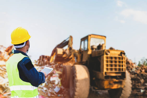 istock Foreman controls the recycle waste separation of recyclable waste plants. 1222788459