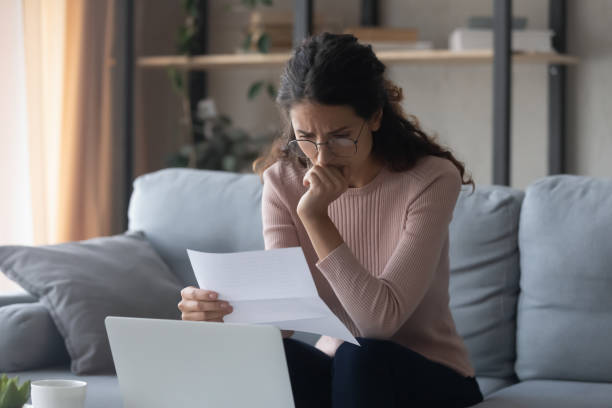 istock Nervous frustrated lady reading bad banking news notification. 1222788485
