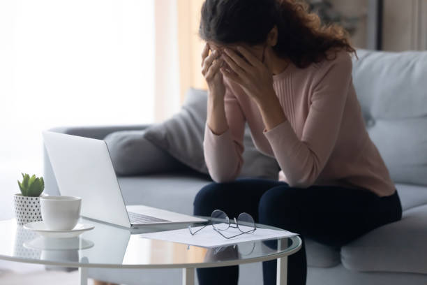 istock Stressed unhappy young woman feeling exhausted after computer overwork. 1222788510