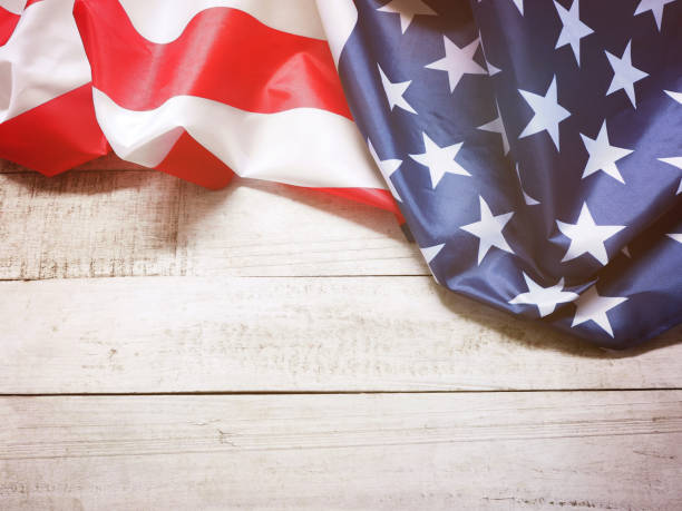 istock American flag on vintage wood 1222789044
