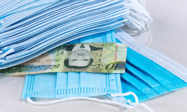 istock Botswana money and face mask against corona virus 1222789229