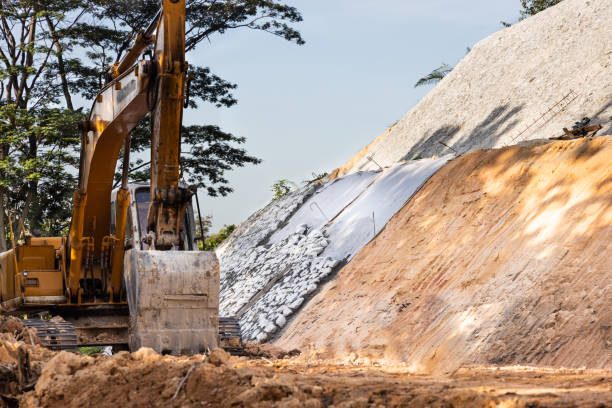istock Slope retention construction work being carried out to manage landslide 1222789826