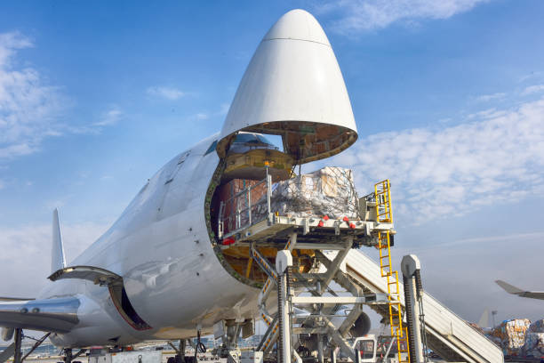 Cargo airplane loading stock photo