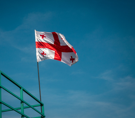 Flag of Georgia waving closeup