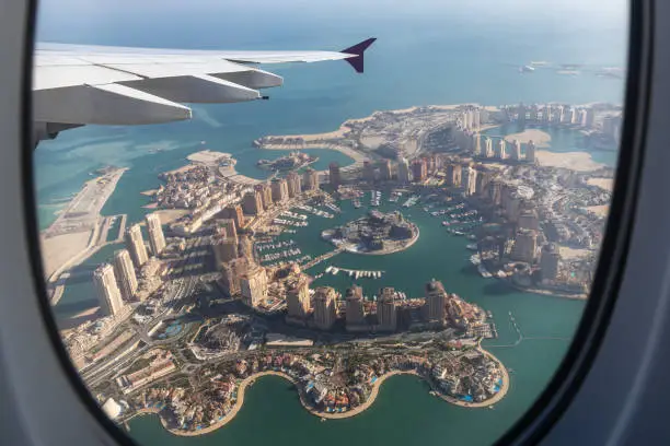 Photo of The Skyline of Doha from the window of an airplane