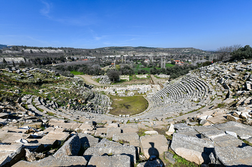 Ephesus Ancient City, Selcuk, Izmir, Turkey - April 21, 2023: Ancient theatre of Ephesus.
