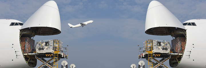 Cargo airplanes loading at airport