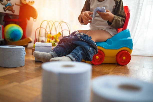 istock Lovely 2 years boy sitting on potty. 1222797577