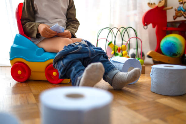 istock Sweet toddler boy, sitting on potty. 1222797674