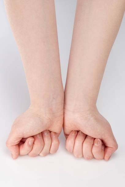 istock one's arms and fists in a white background. 1222797704