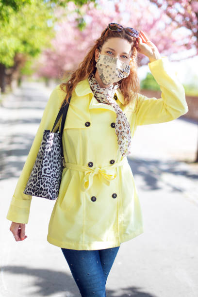 istock Young redhead woman in park walking during springtime 1222799675