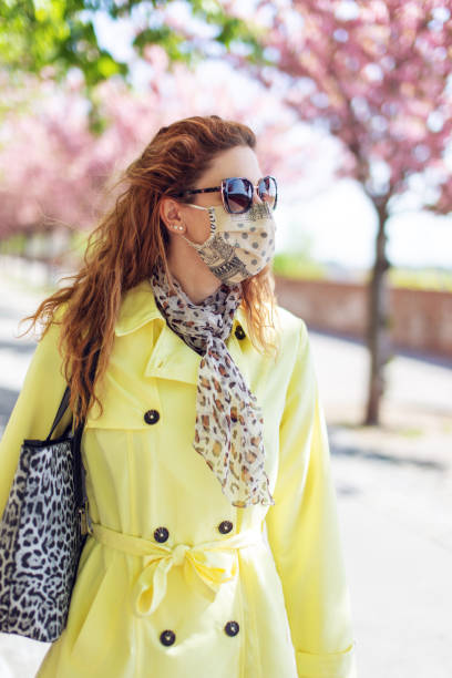 istock Young redhead woman in park walking during springtime 1222799702
