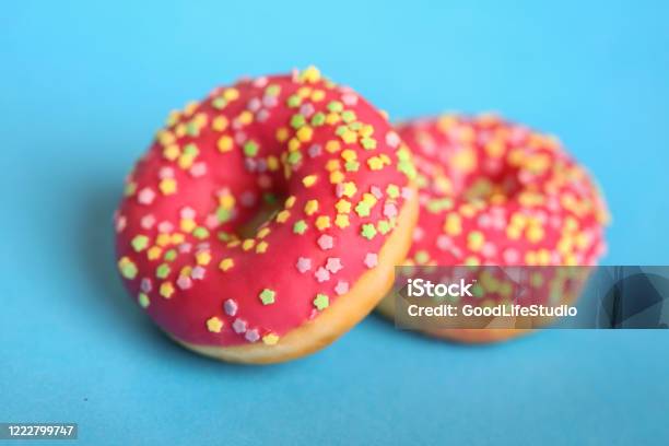 Delicious Pink Glazed Donuts Stock Photo - Download Image Now - American Culture, Baked, Baked Pastry Item