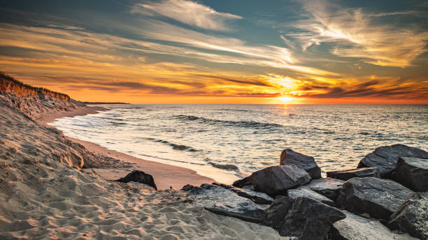 Colorful sunrise over the beach at Holgate, NJ stock photo