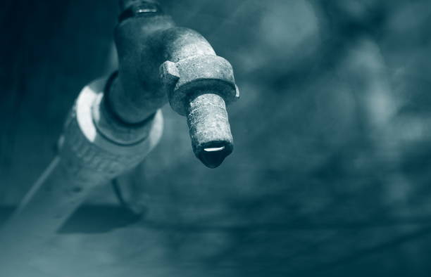 istock Old tap outdoors with the water drops 1222806931