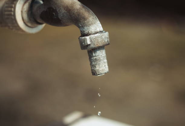 istock Old tap outdoors with the water drops 1222808666