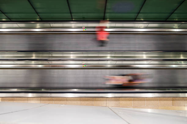 Kuala Lumpur, Malaysia: Long exposure of a walkalator or treadmill directly from above.