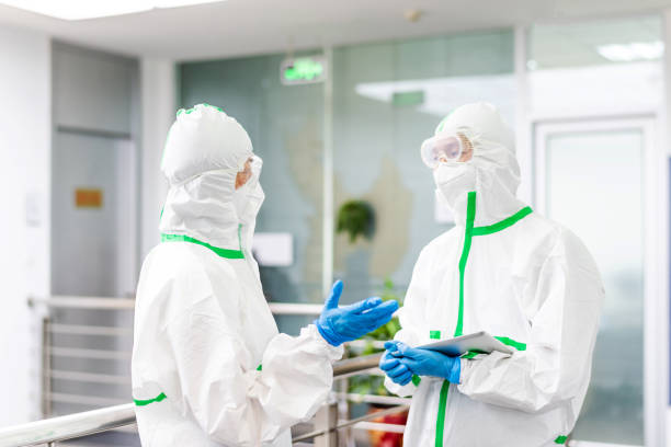 istock Two Asian doctors discuss work in the hospital 1222810896