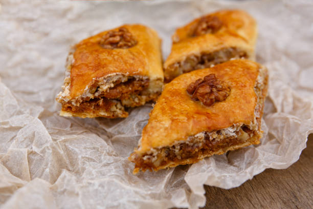 istock Eastern sweets - dessert baklava decorated with walnuts 1222810924