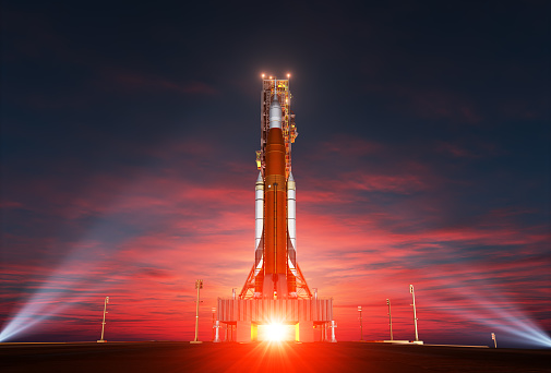 Space Launch System On Launchpad Over Background Of Sunrise. 3D Illustration.