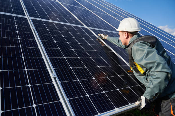 istock Male electrician checking photovoltaic solar panel. 1222813549