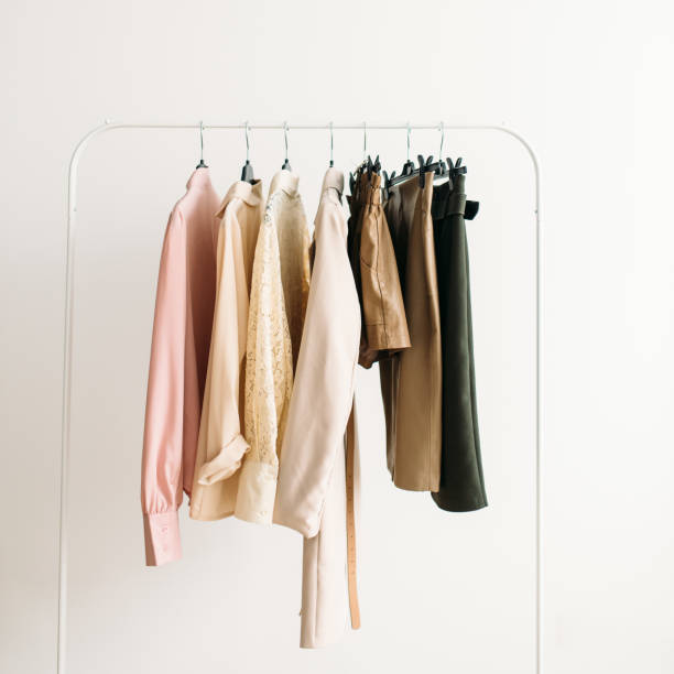 Capsule clothes in beige and pink colors closeup stock photo