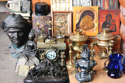 Vintage samovar and orthodox icons on flea market in Moscow