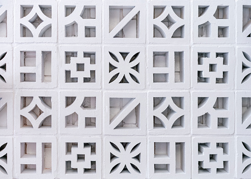White concrete block lattice decoration on building. Thailand. Phuket