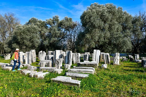 Gravestone on white background, tombstone with RIP inscription on it, 3d rendering