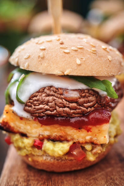 istock Mini Veggie Burger with Grilled Cheese, Mushroom, Guacamole and Arugula 1222817141