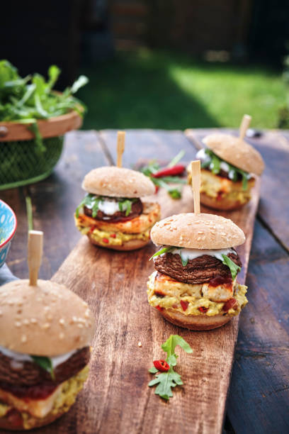 istock Mini Veggie Burger with Grilled Cheese, Mushroom, Guacamole and Arugula 1222817446