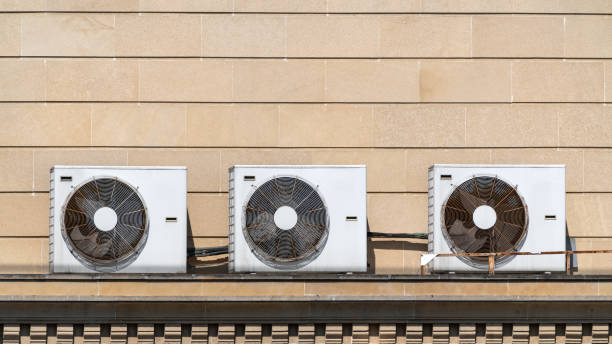 istock Air conditioning units on house roof 1222819685