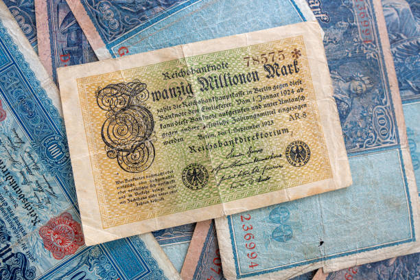 some old historical German banknotes lie spread out on a table
