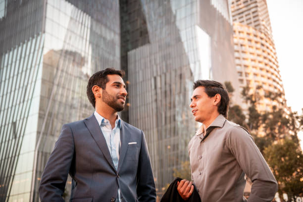 istock Two businessmen in front of the office building 1222820379
