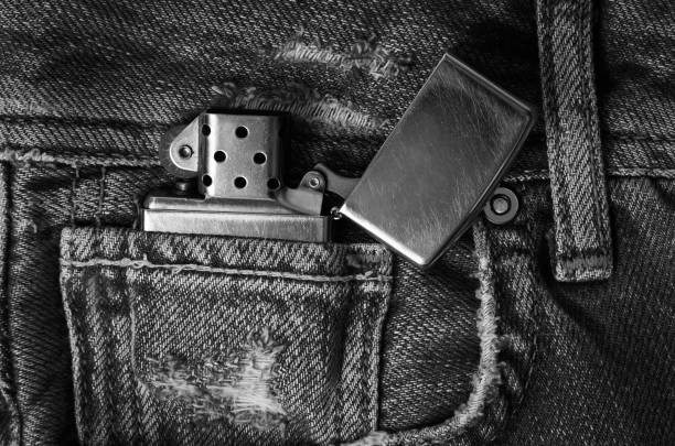 istock Metal lighter on the jeans 1222821602