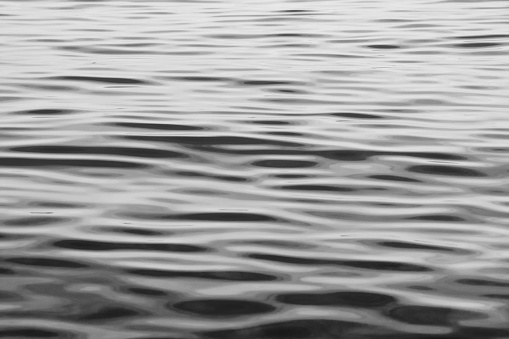 Abstract sea water in evening in black and white
