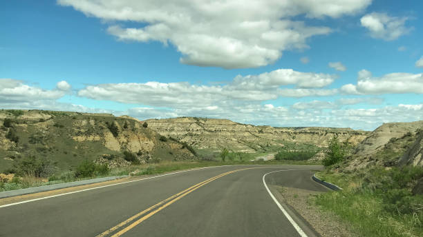 istock Empty highway through the badlands South Dakota 1222823898