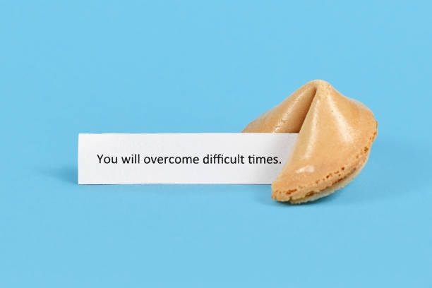 Fortune cookie on red paper.