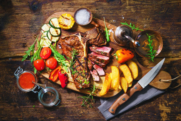 istock Beef steak with grilled vegetables and seasoning 1222826835