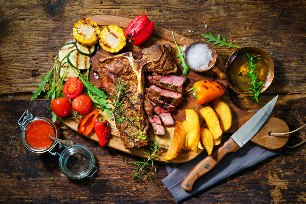 istock Beef steak with grilled vegetables and seasoning 1222826843