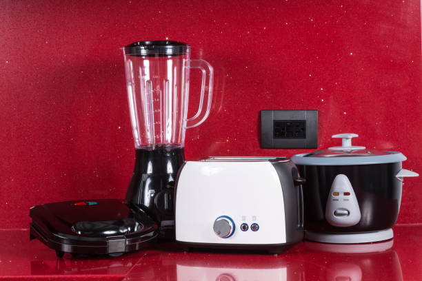 istock Household appliances in modern kitchen red background. 1222830069